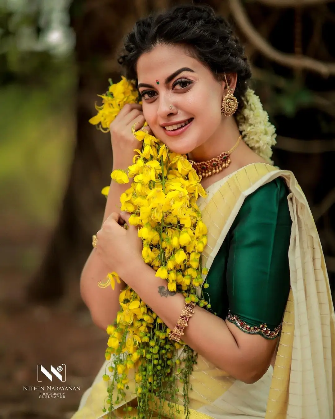 Anusree Nair In Beautiful Earrings Jewellery White Saree Green Blouse